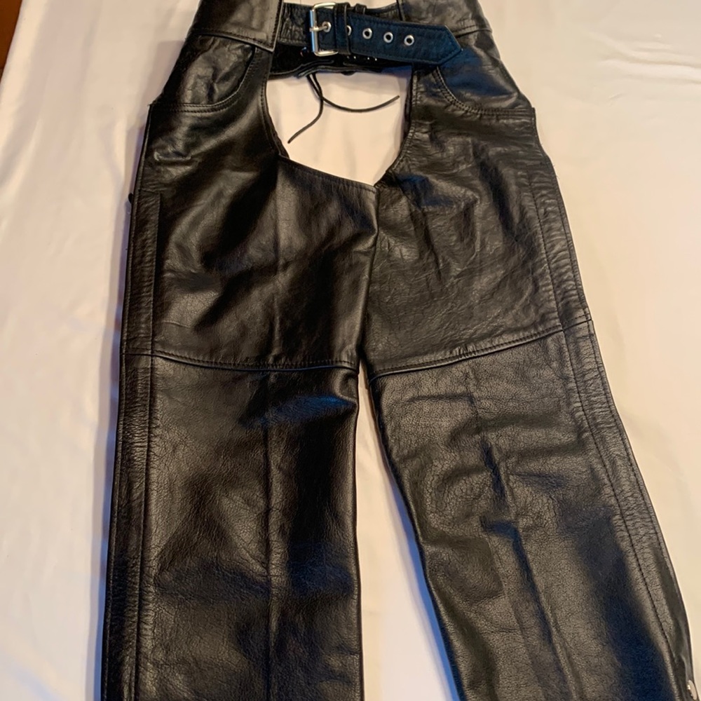 Women’s black leather riding chaps. XXS size and in new condition. Fits like a S